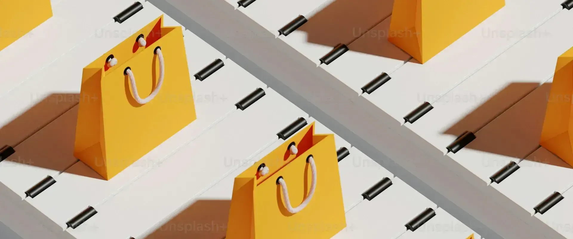 Yellow shopping bags arranged in a pattern