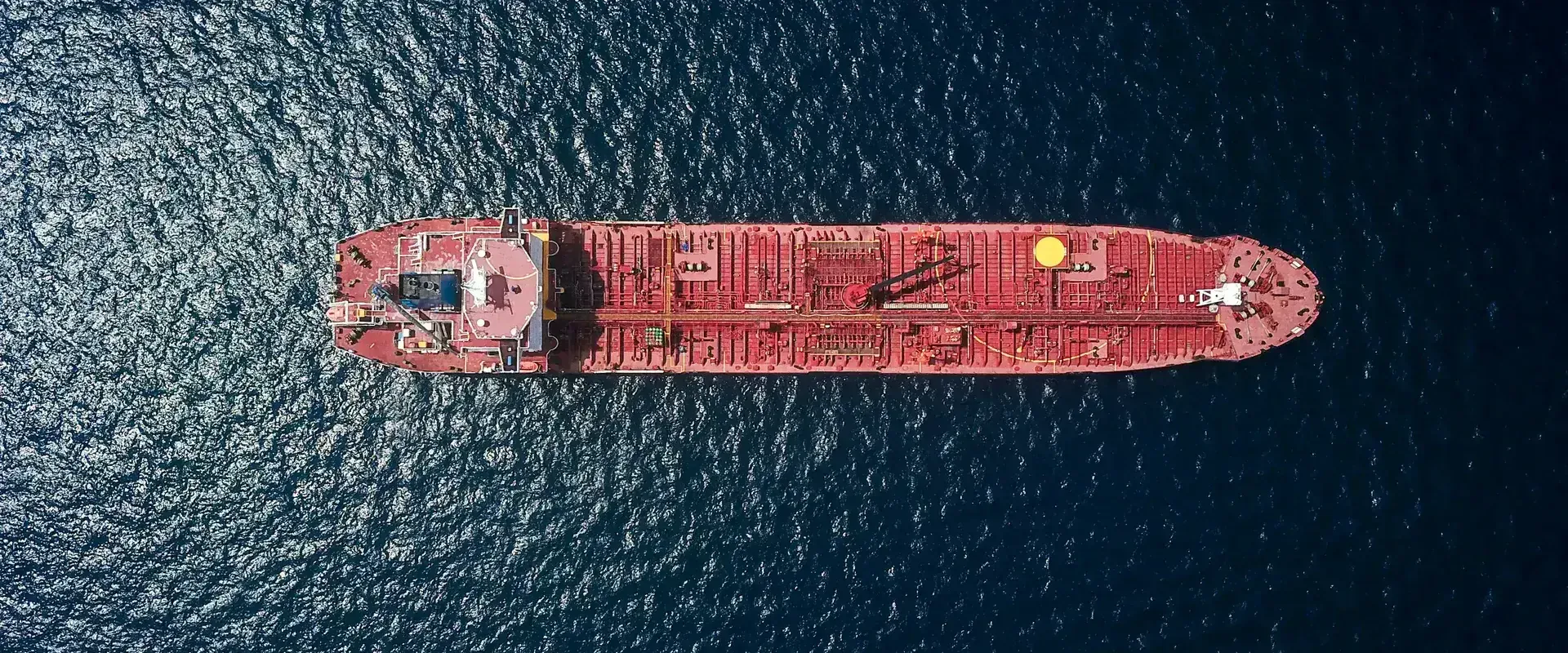 Aerial view of cargo ship at sea
